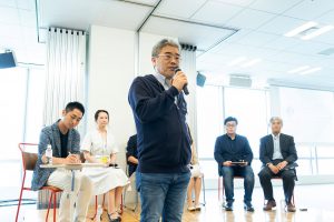 平場で議論ができる団体にと抱負を述べる代表理事の瀬尾傑 JIMAシンポジウム